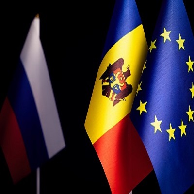 Flags of Moldova and European Union standing close with Russian flag staying in the far background pointing Moldova is getting closer with EU than Russia