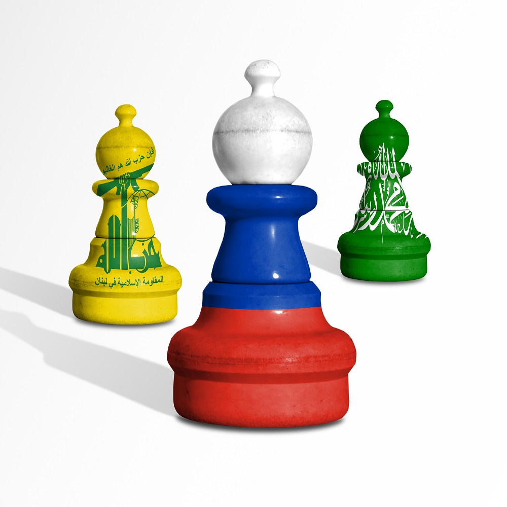 Emblems of Russian and Hezbollah's army depicted on the chess pieces