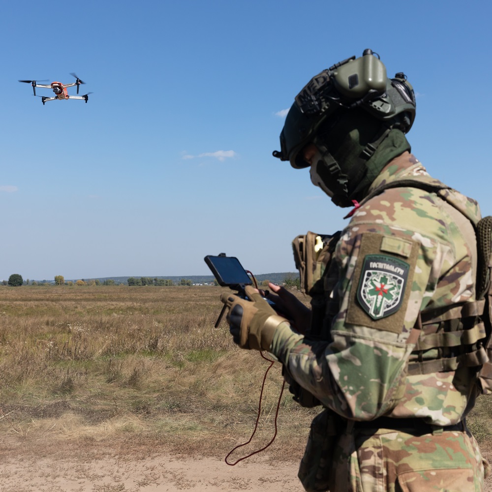 Ukrainian soldier launching a drone for reconnaissance